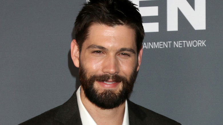 Casey Deidrick posing at an event