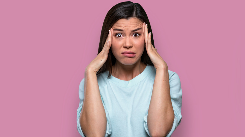 woman feeling regrets after a breakup